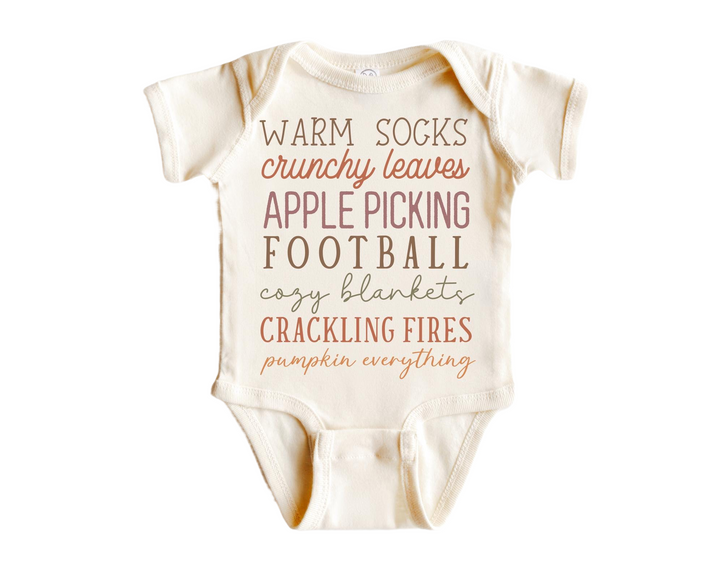 a baby bodysuit that says warm socks, crunchy leaves, apple picking football