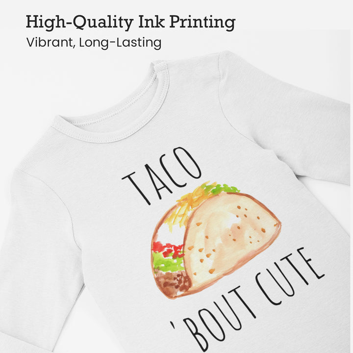 a white shirt with taco'bout cute on it