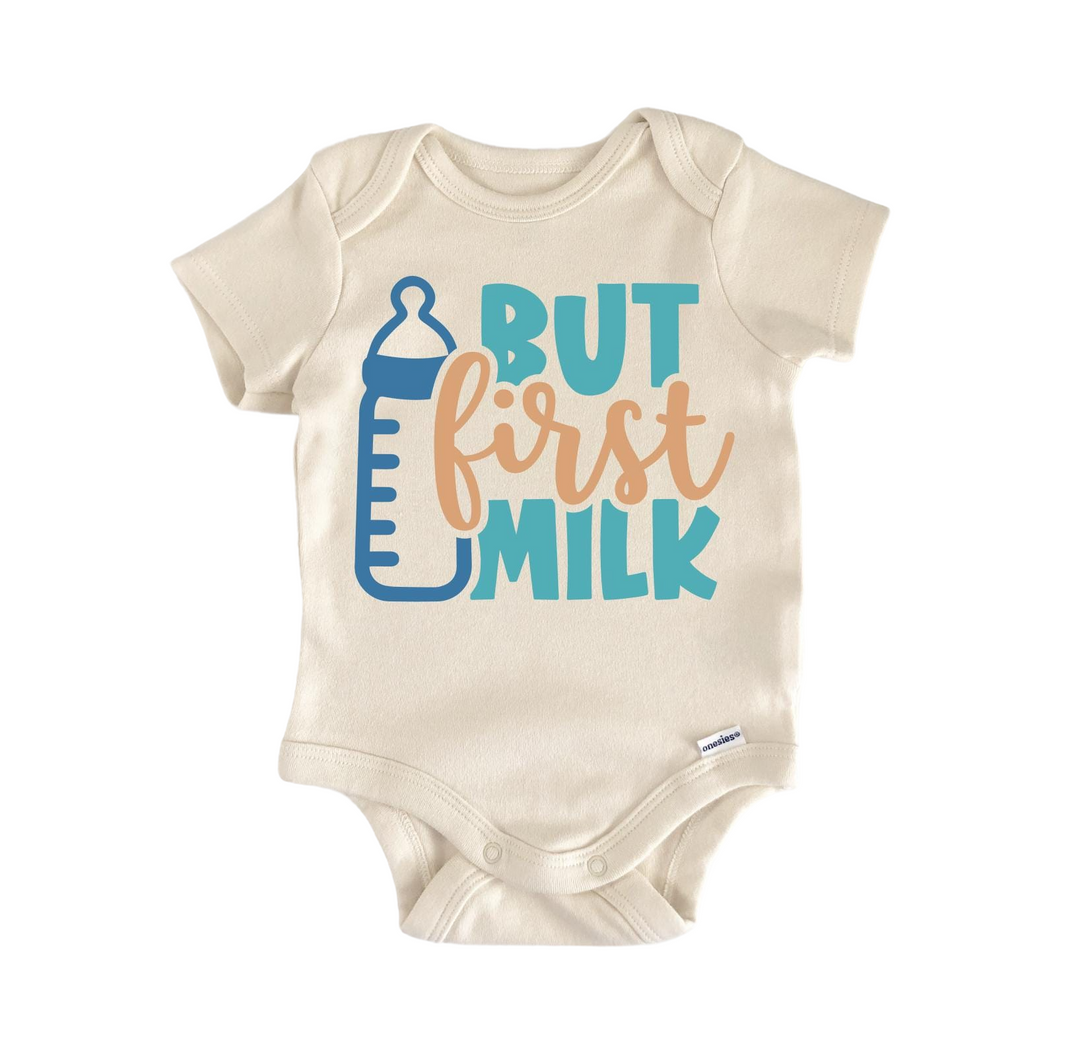 a baby bodysuit that says but first milk