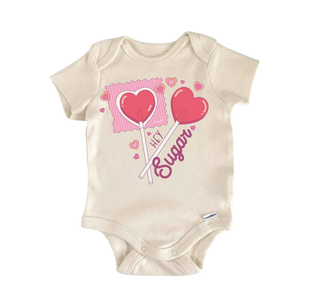 a baby bodysuit with two hearts on it