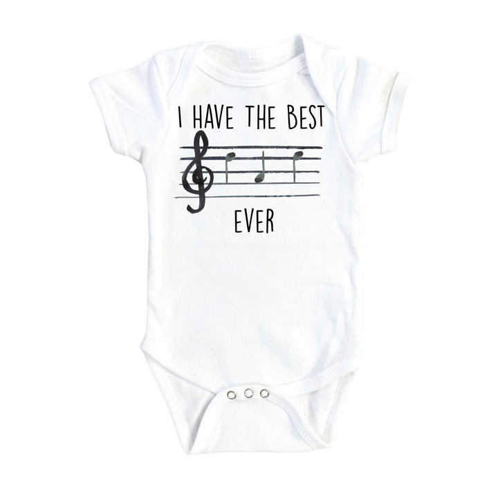 a white bodysuit with musical notes on it