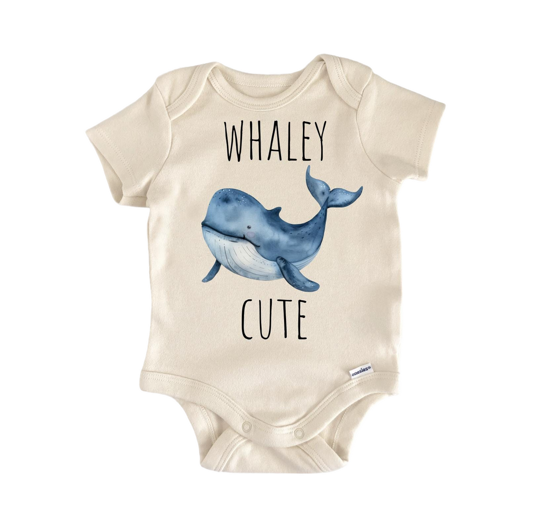 a white bodysuit with a blue whale on it