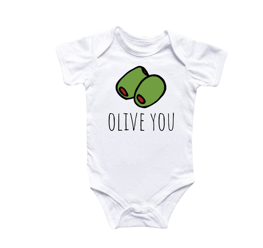 a white bodysuit with an image of two green heads on it