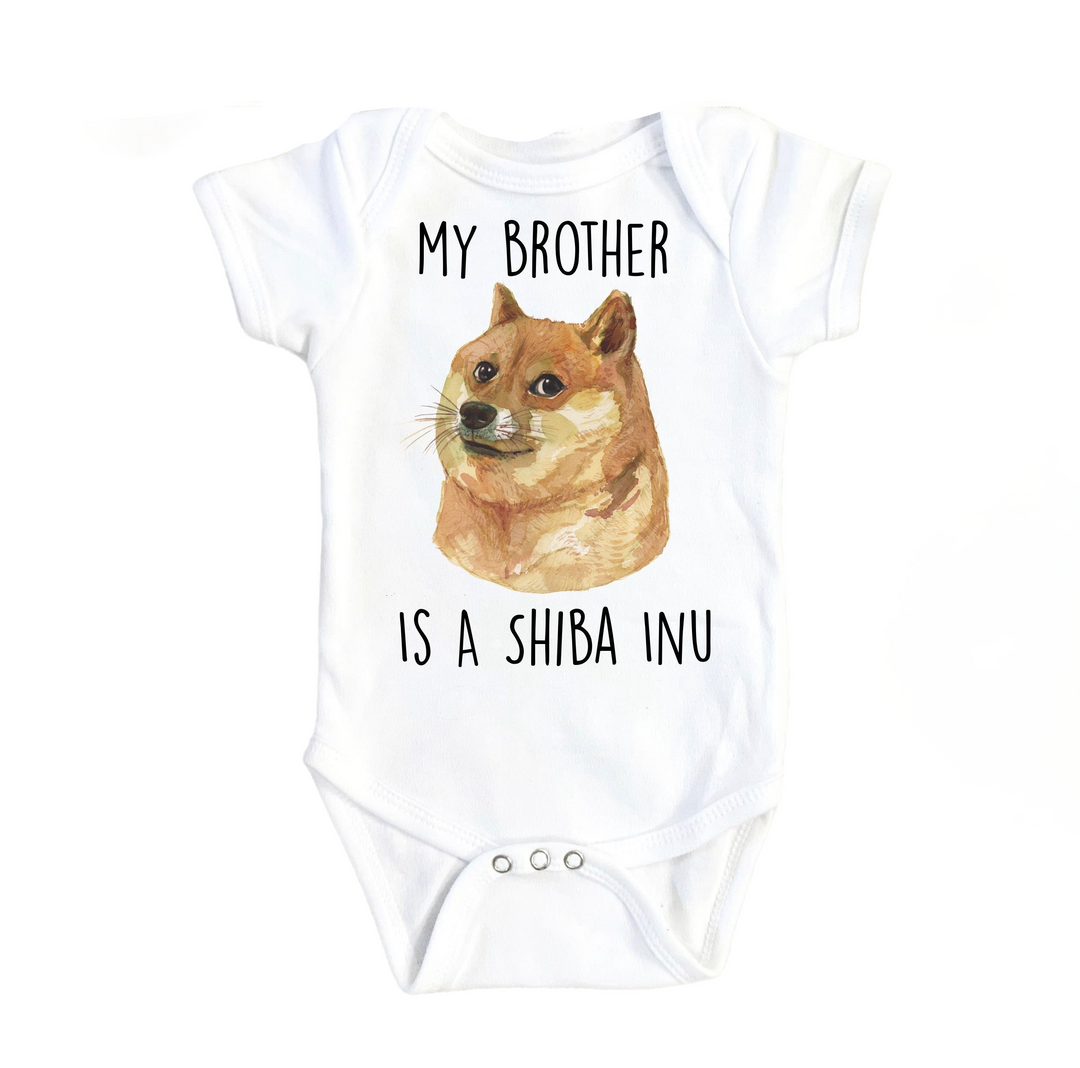 a baby bodysuit with a picture of a dog on it