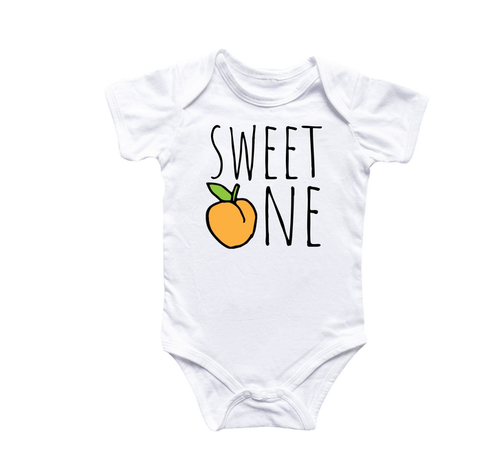 a white bodysuit with an orange and the words sweet one on it