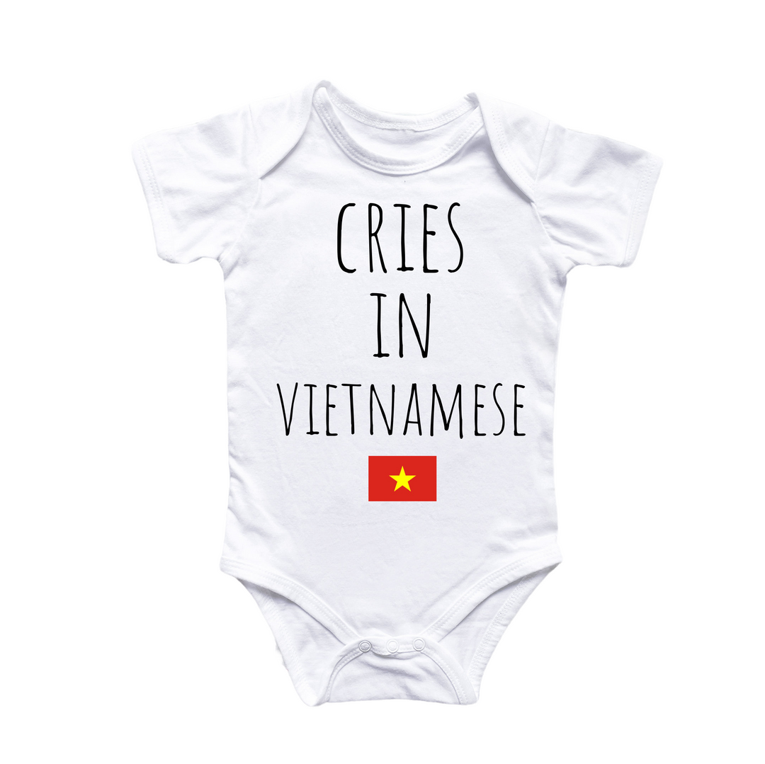 a white bodysuit with the words cries in vietnamese on it