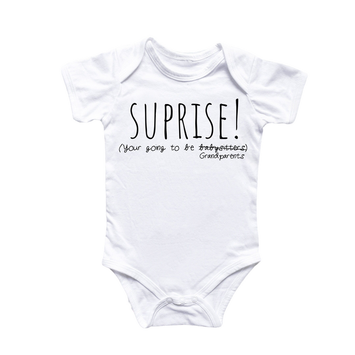 a white bodysuit with the words surprise written on it