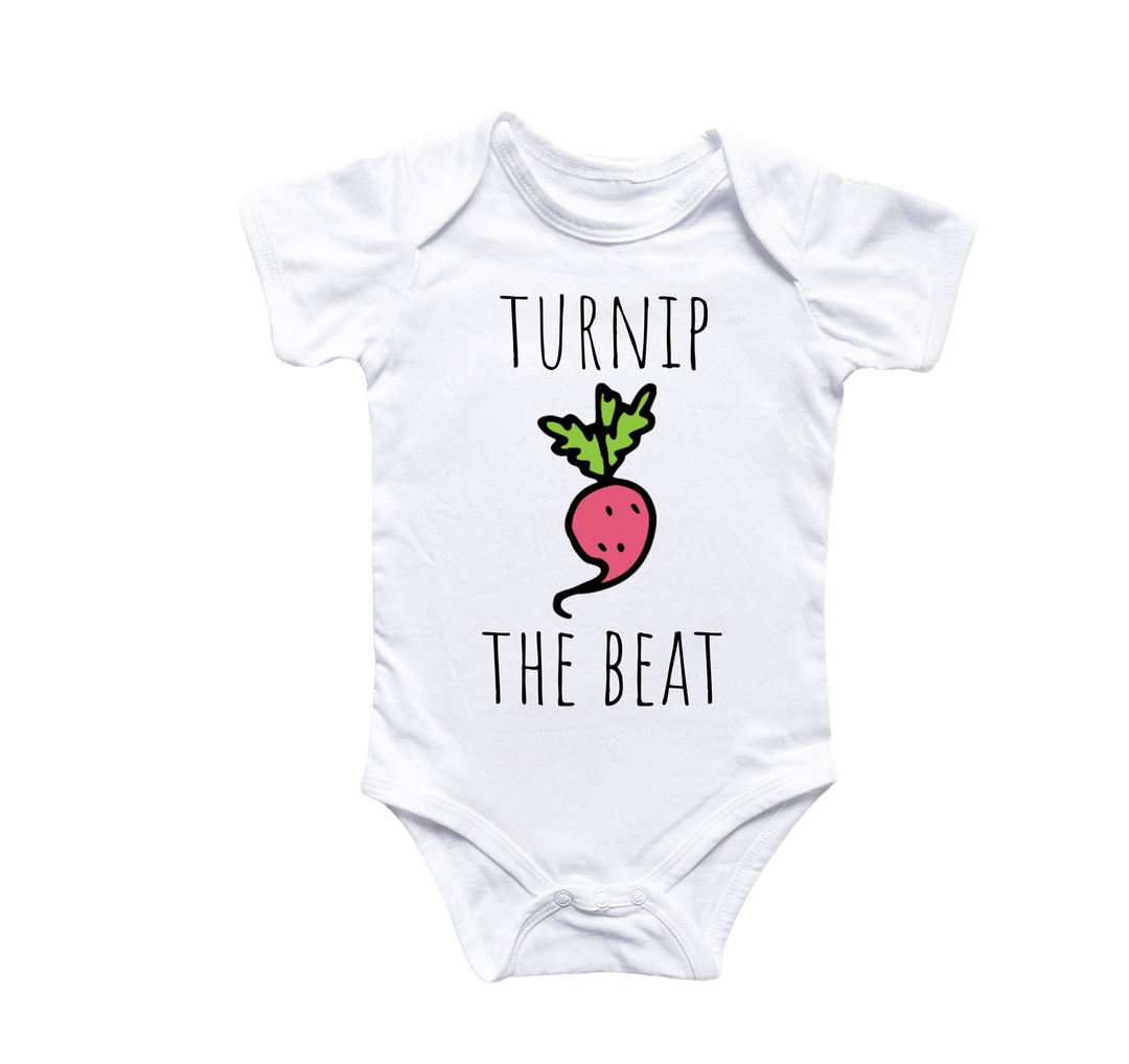 a white baby bodysuit with the words turnip the beat on it
