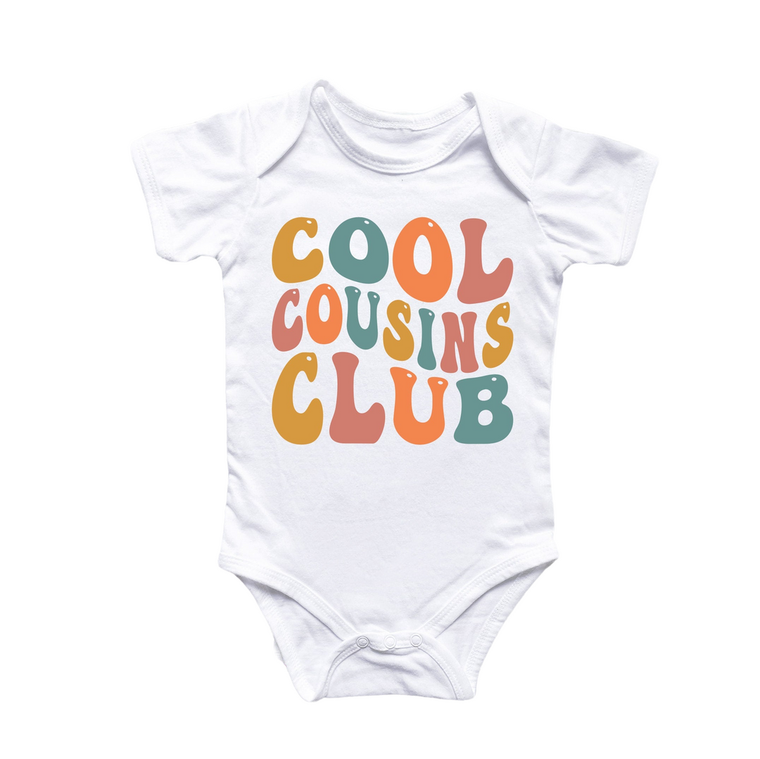 a white bodysuit with the words cool cousins club printed on it