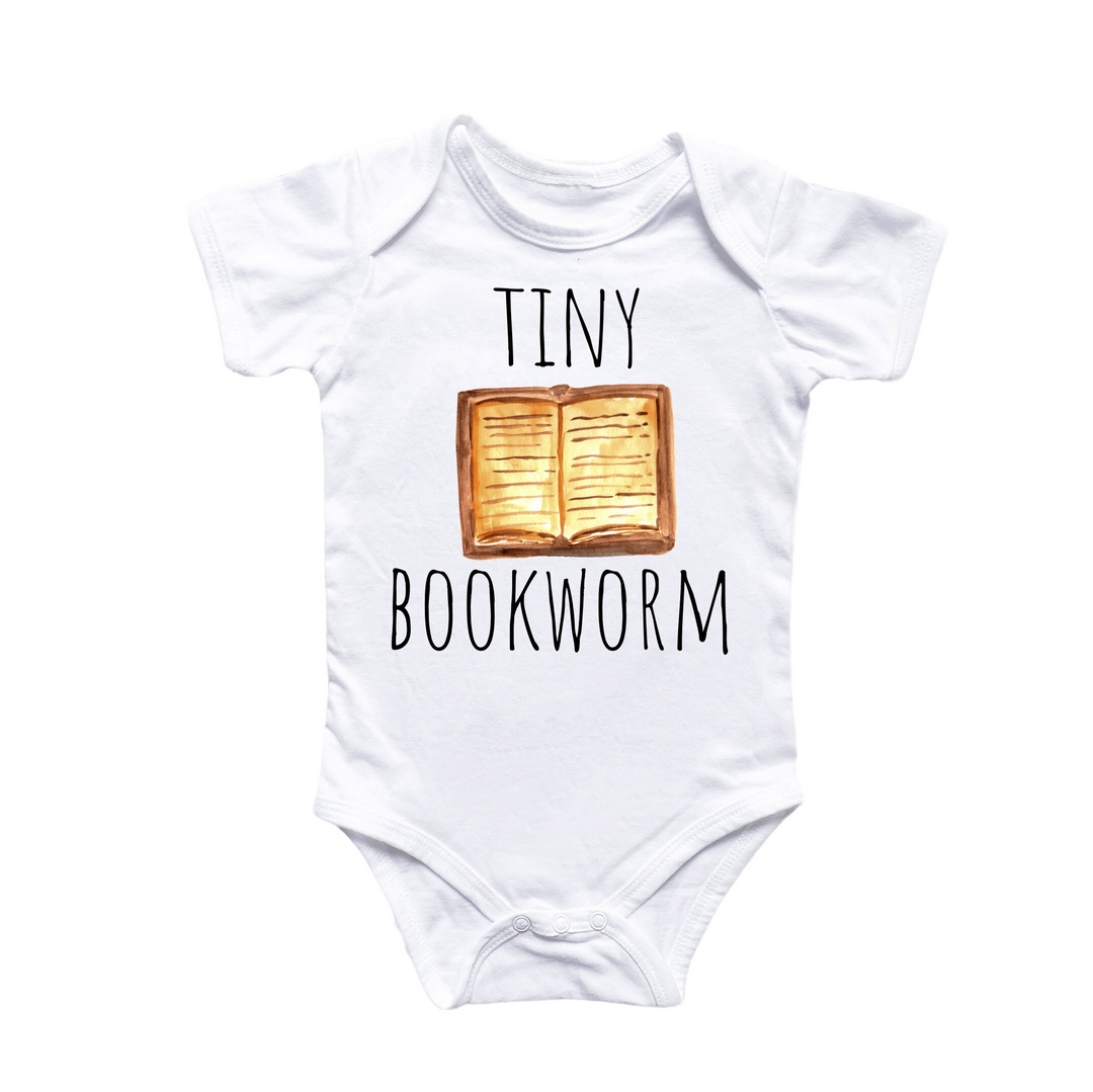 a baby bodysuit that says tiny bookworm