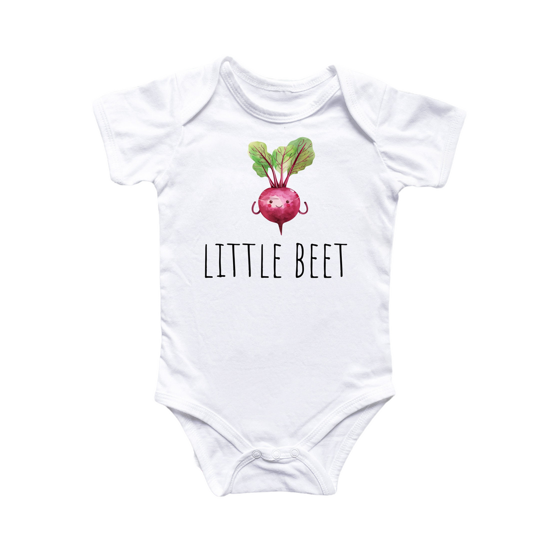 a white baby bodysuit with a radish on it