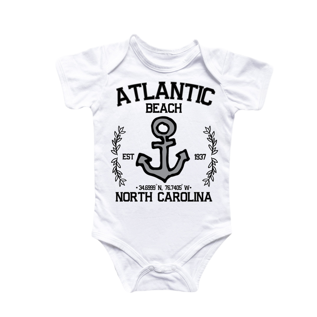 a white bodysuit with an anchor and the words atlantic beach on it