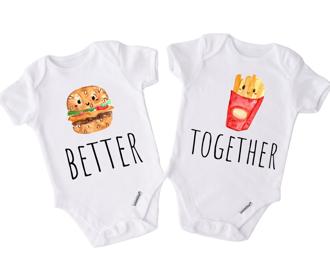 two baby onesuits with a hamburger and fries on them