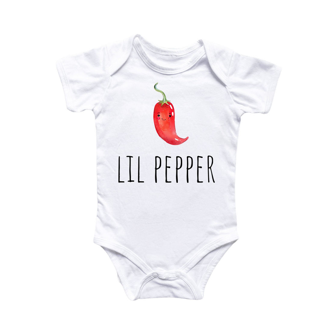 a white bodysuit with a red pepper on it