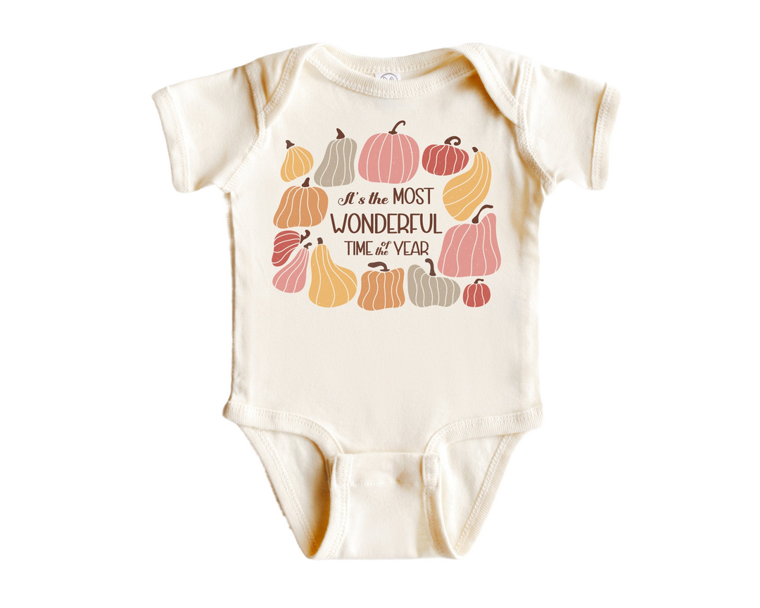 a baby bodysuit that says it's the most wonderful time of the year