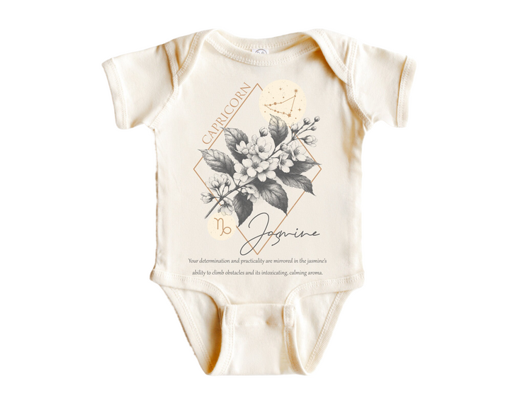 a baby bodysuit with a picture of flowers on it