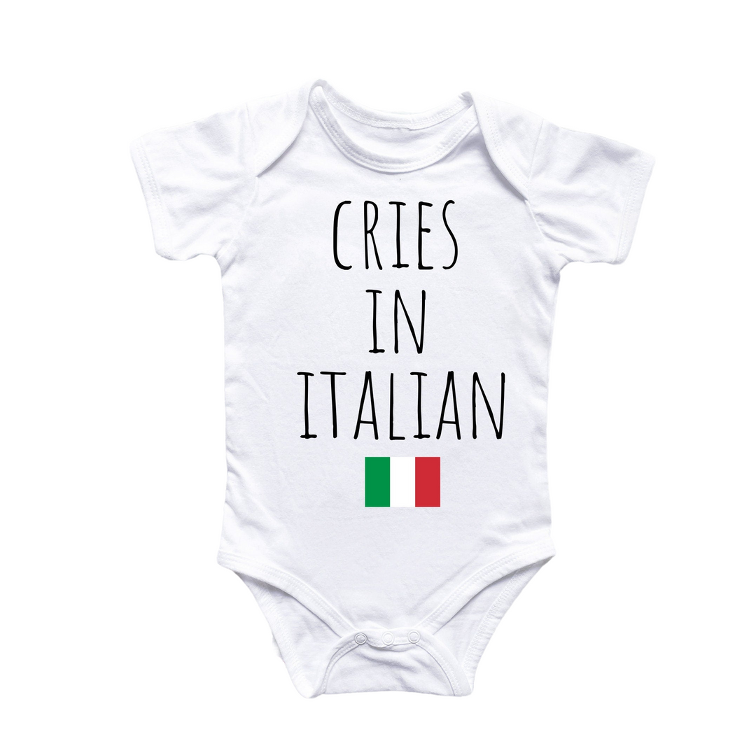 a white onesuit with the words crises in italian on it