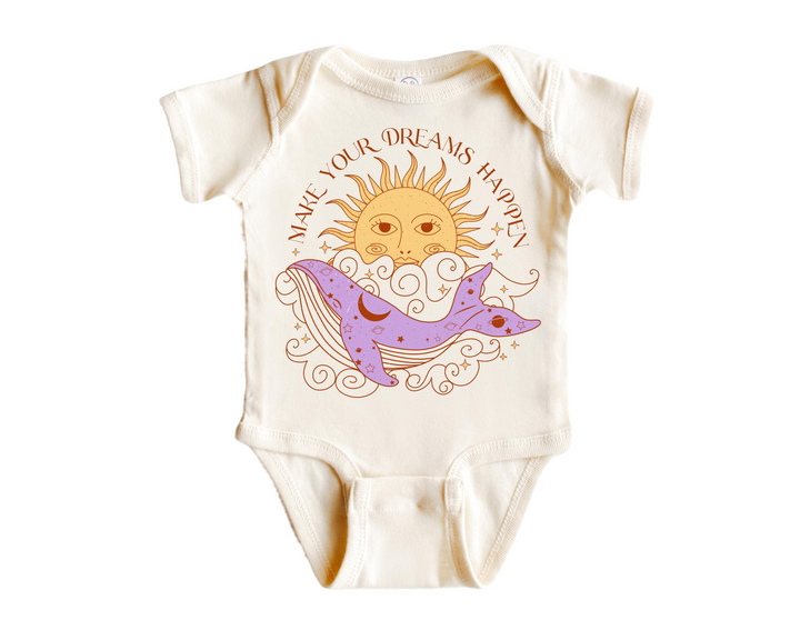 a baby bodysuit with an image of a whale and sun on it