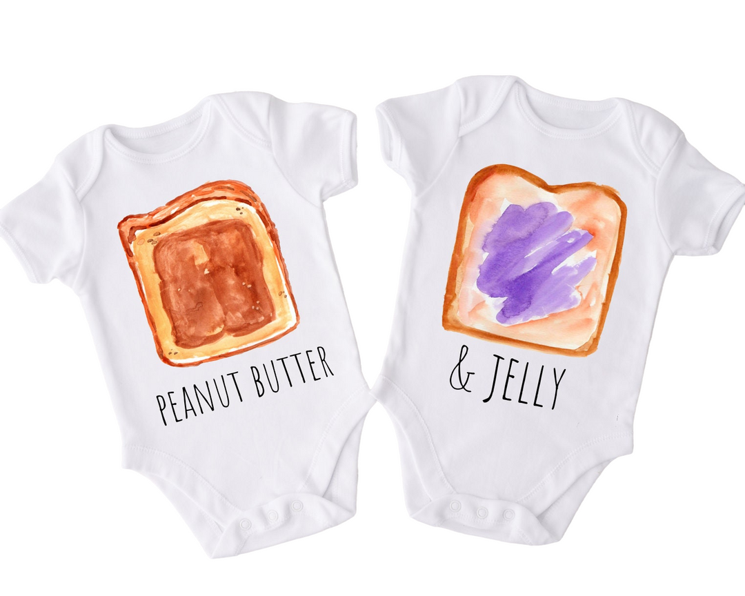 two baby onesuits with peanut butter and jelly on them