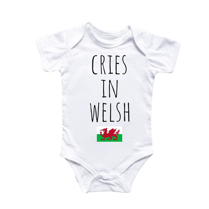 a white bodysuit with the words cries in wales printed on it