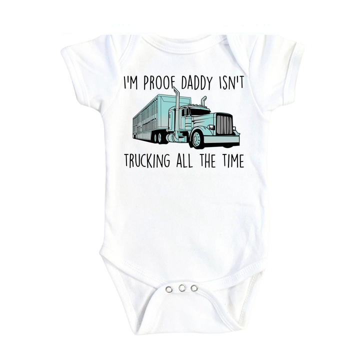 a white baby bodysuit with a truck on it