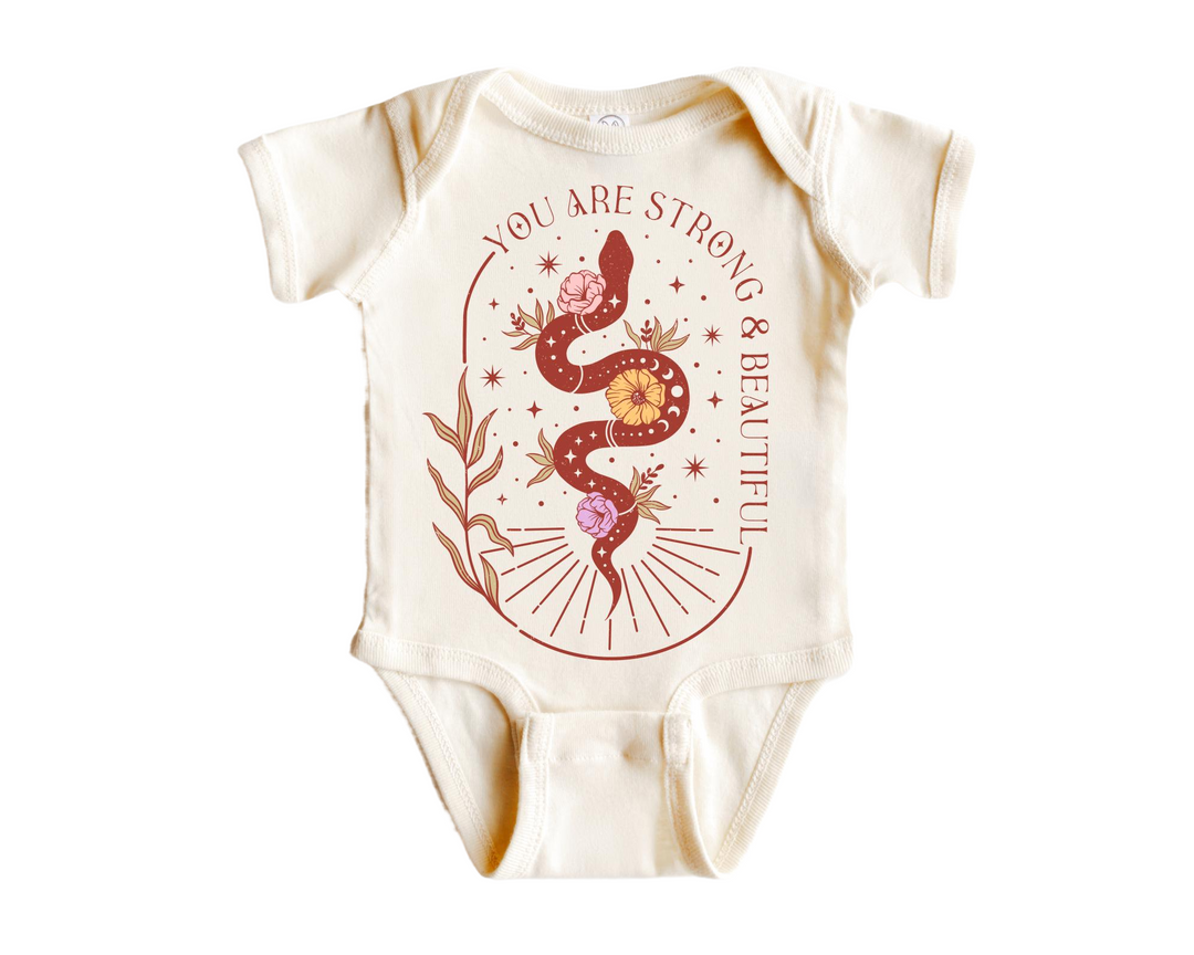 a baby bodysuit with a picture of a snake on it