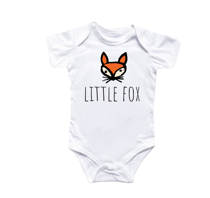 a white bodysuit with a fox head and the words little fox on it