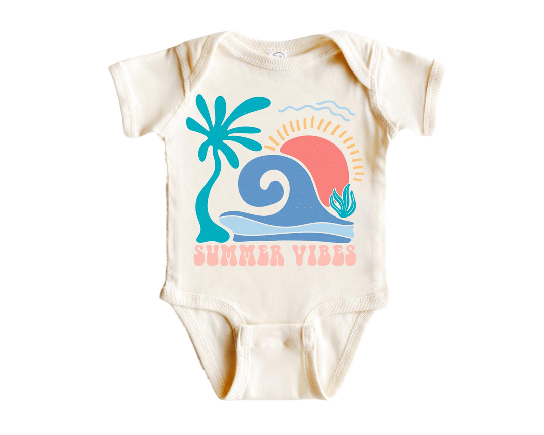 a baby bodysuit with a picture of a wave and palm trees