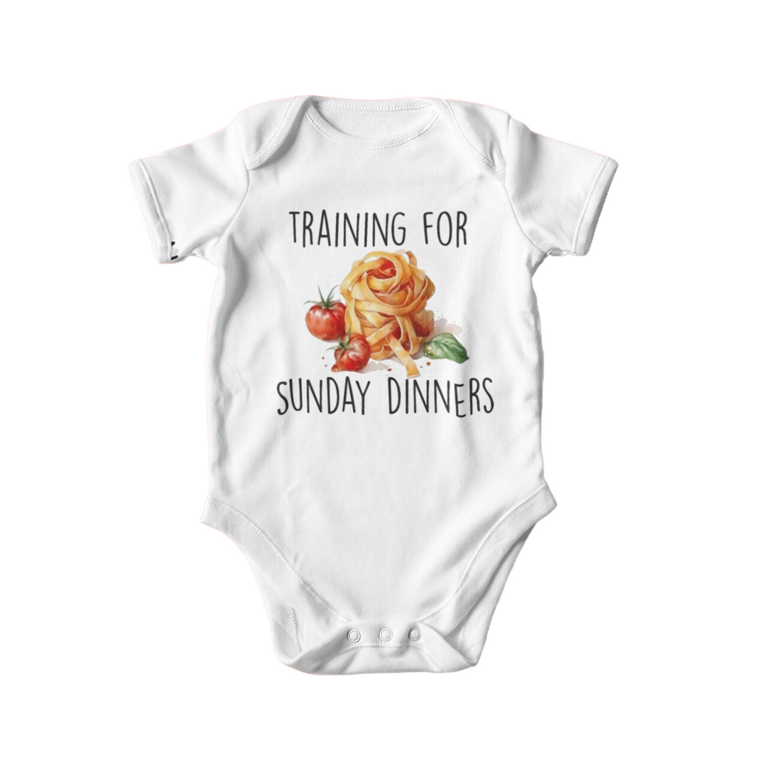 a baby bodysuit that says training for sunday dinners