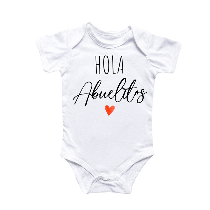 a white baby bodysuit with the words hola abuelos written on it