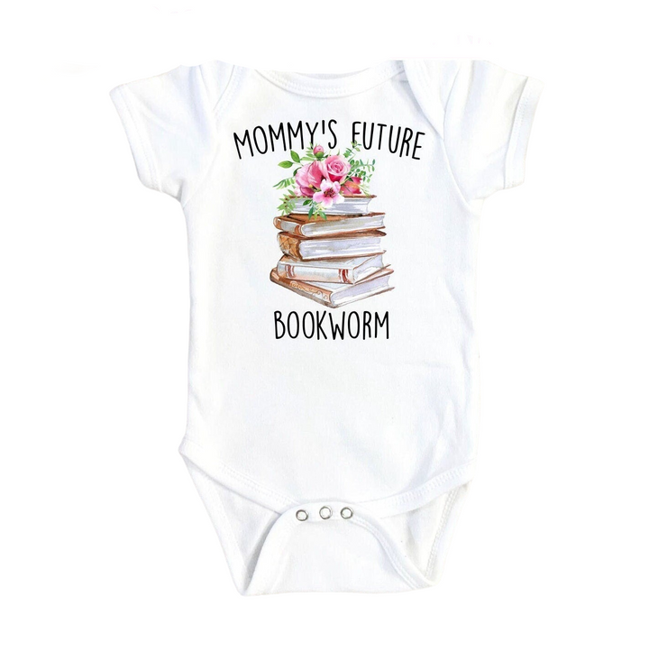 a baby bodysuit with a stack of books on it