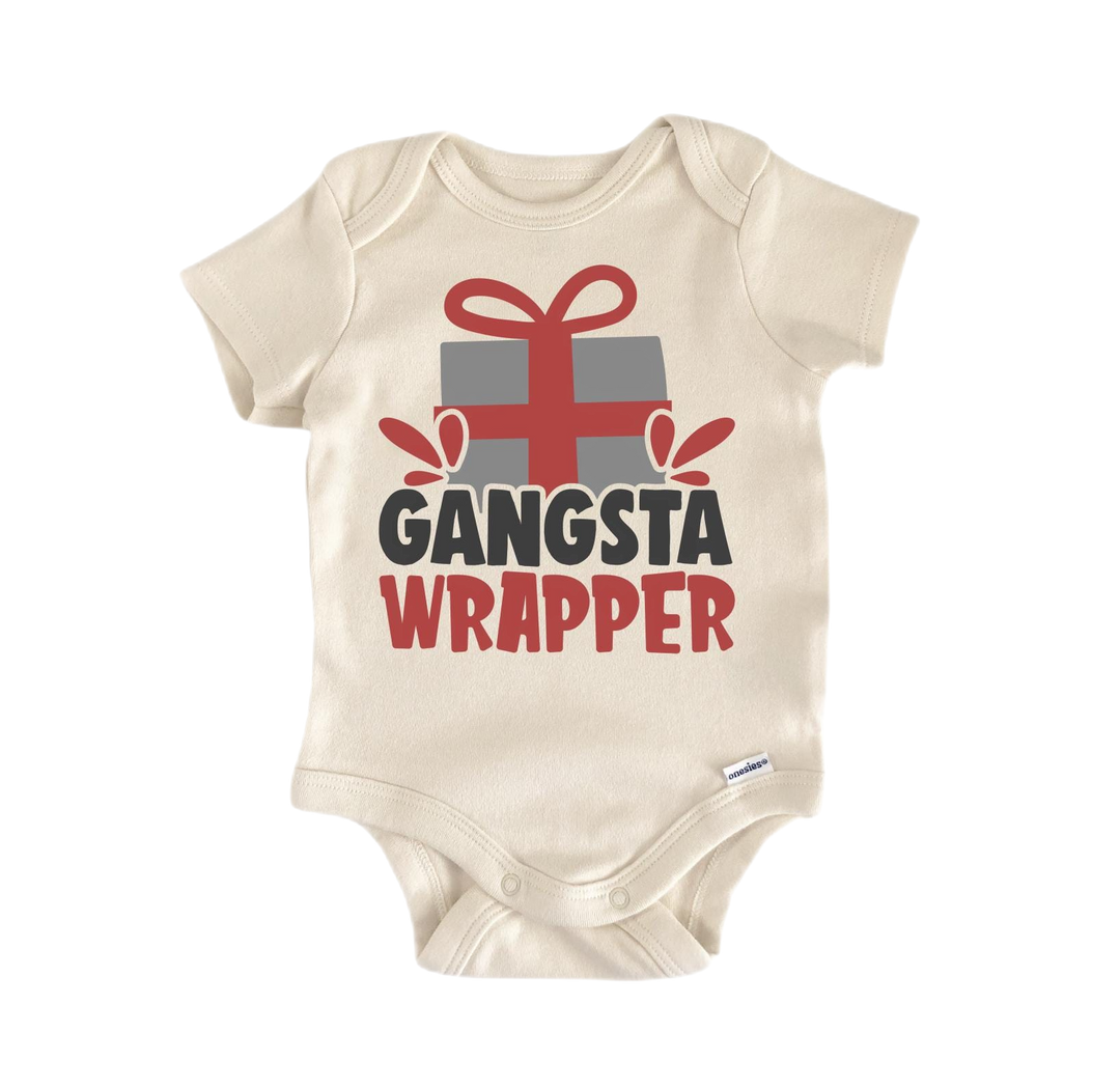 a baby bodysuit with a gift wrapped in a red ribbon