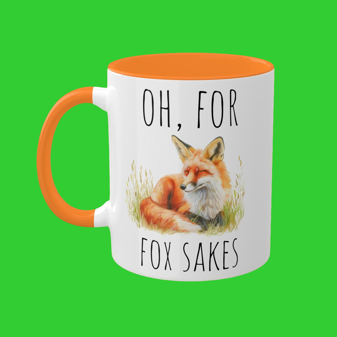 an orange and white coffee mug with a picture of a fox