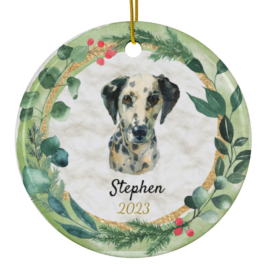 a ceramic ornament with a dog's face in a wreath