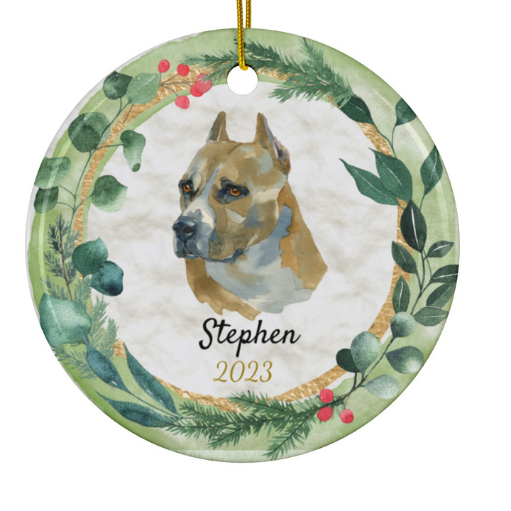 a ceramic ornament with a dog's face on it