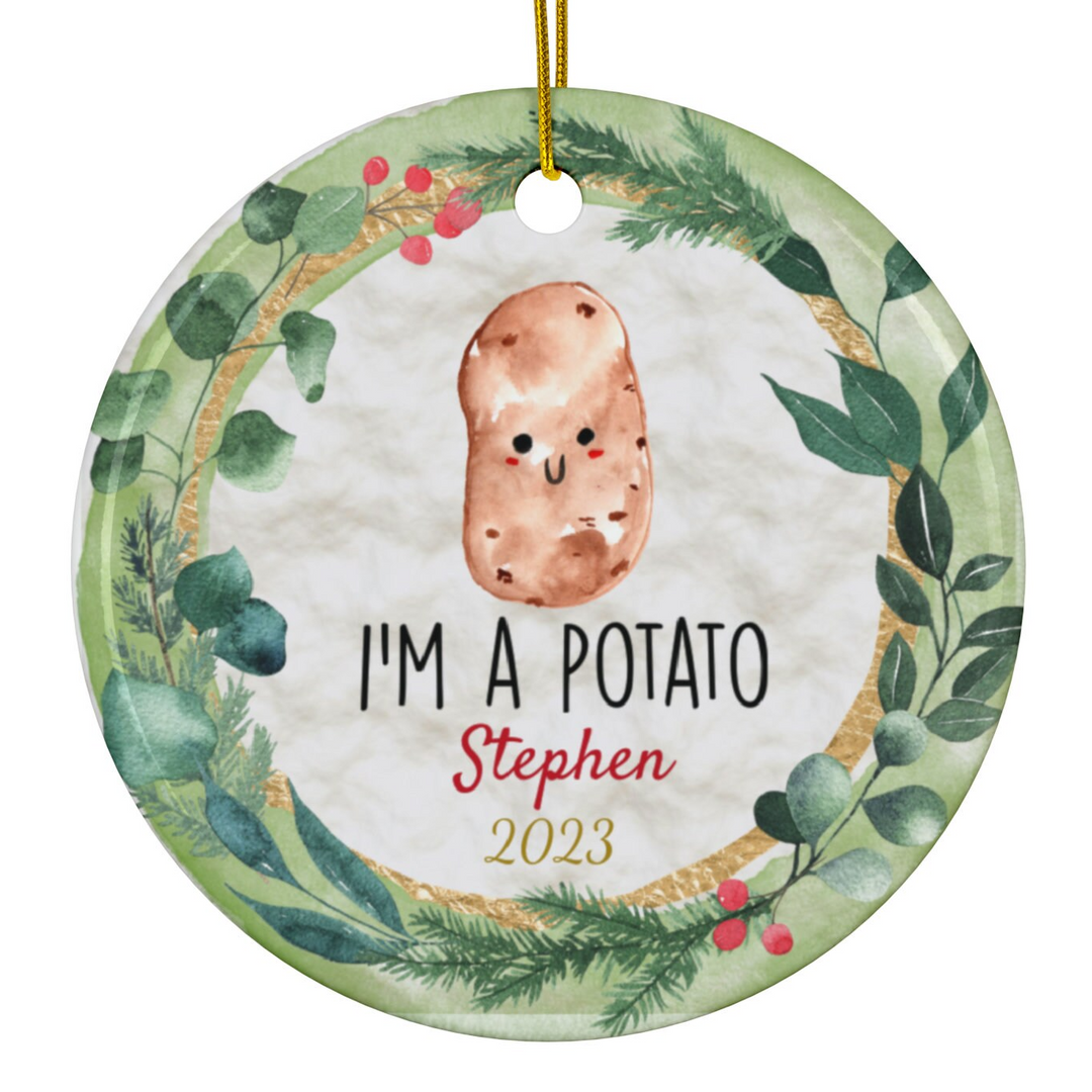 a ceramic ornament with a watercolor painting of a potato