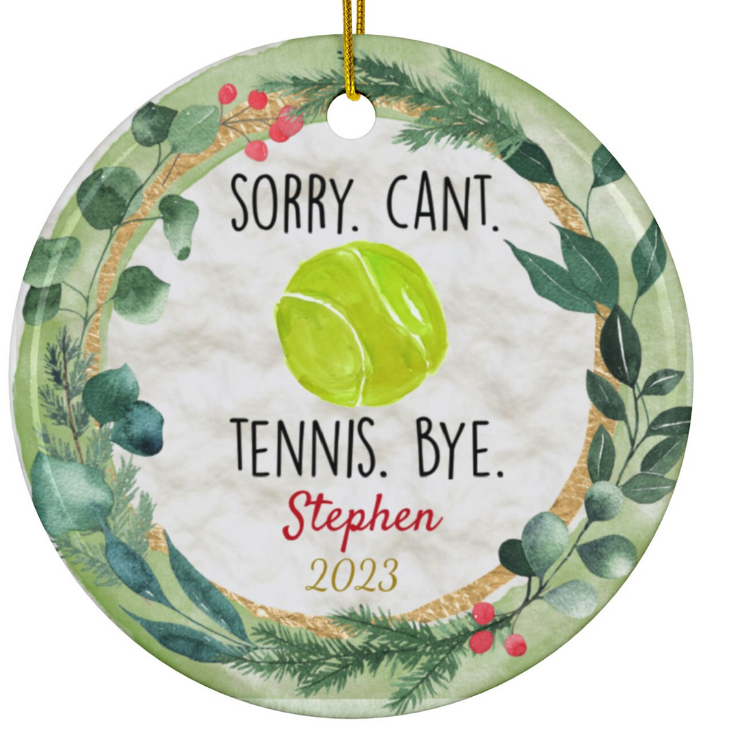 a ceramic ornament with a tennis ball on it