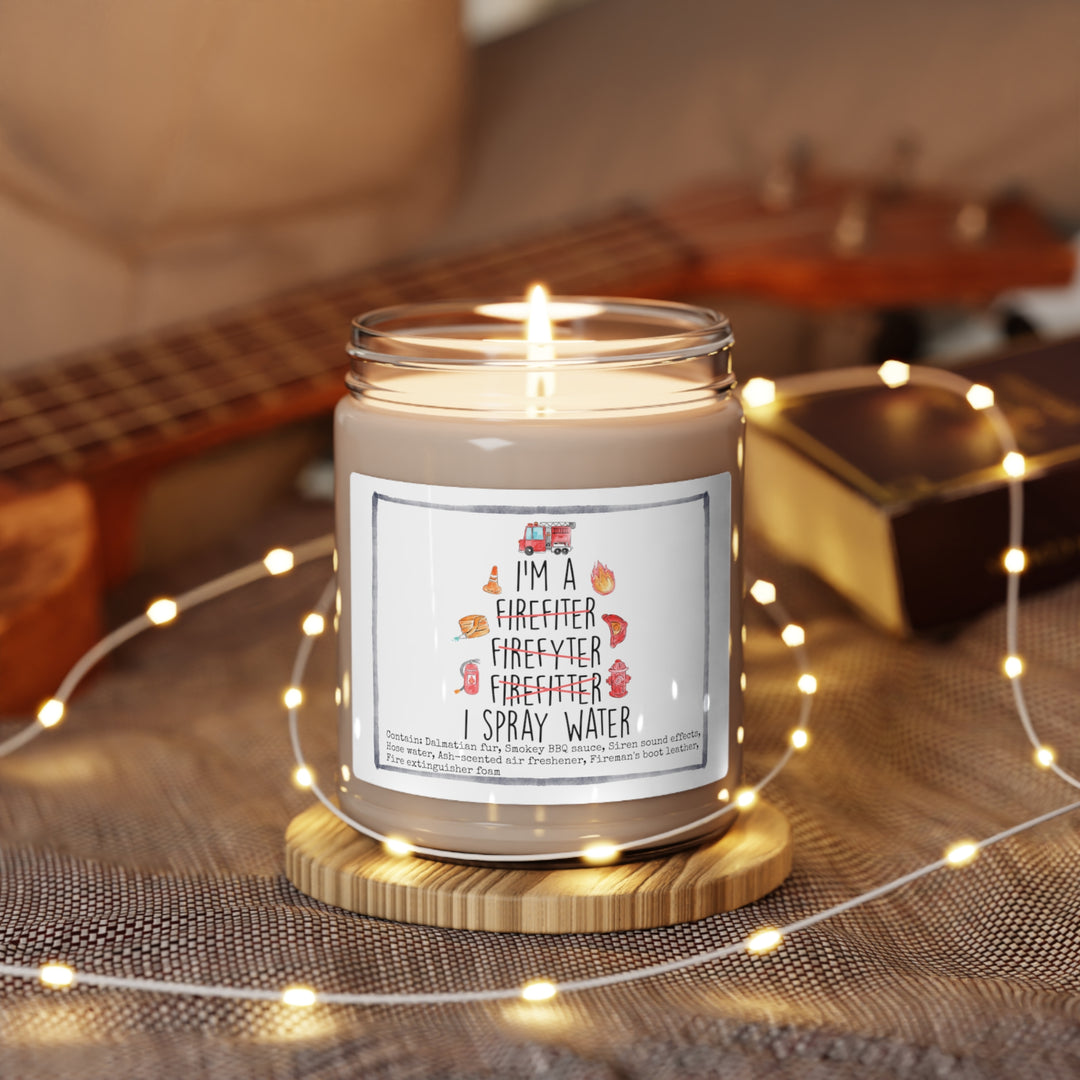 a candle sitting on top of a table next to a guitar