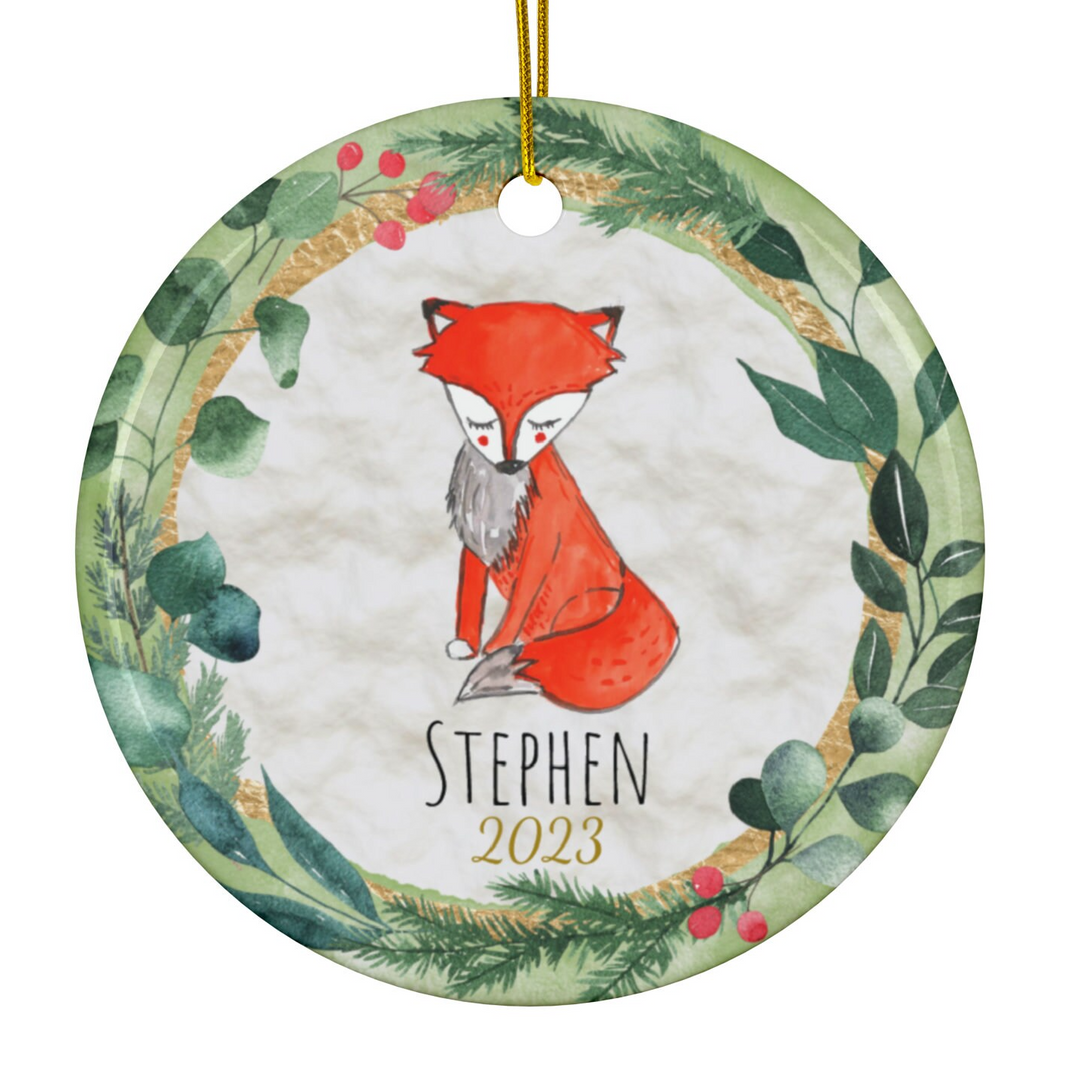 a round ornament with a fox and leaves on it