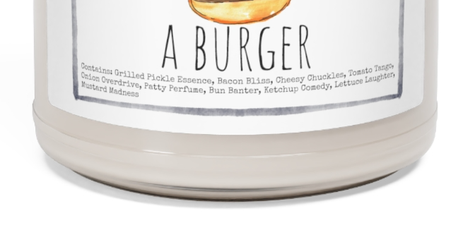 a jar of a candle that says smells like a burger