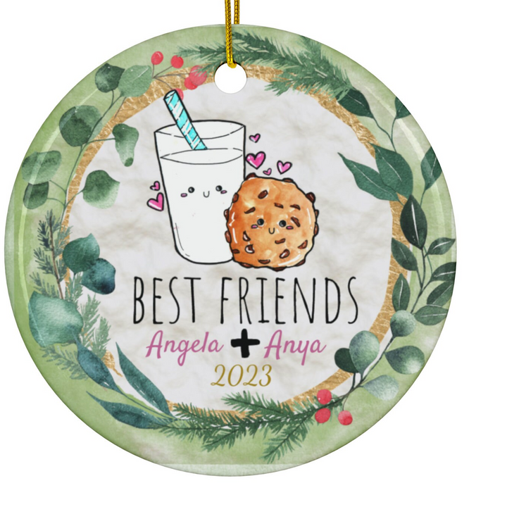 a christmas ornament with a cookie and a glass of milk