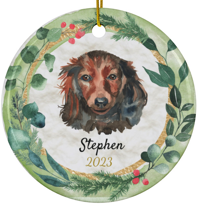 a christmas ornament with a dog's face on it