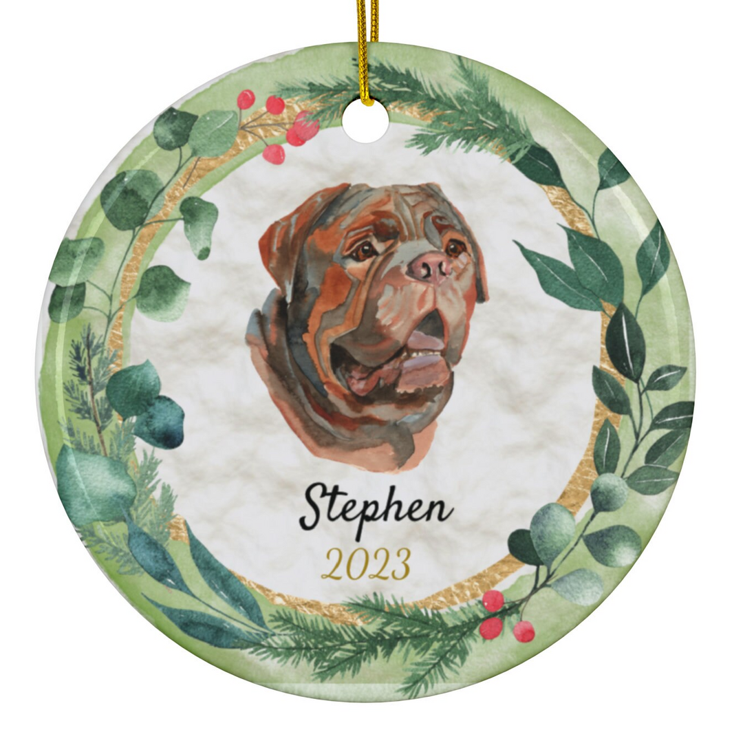 a ceramic ornament with a dog's face on it