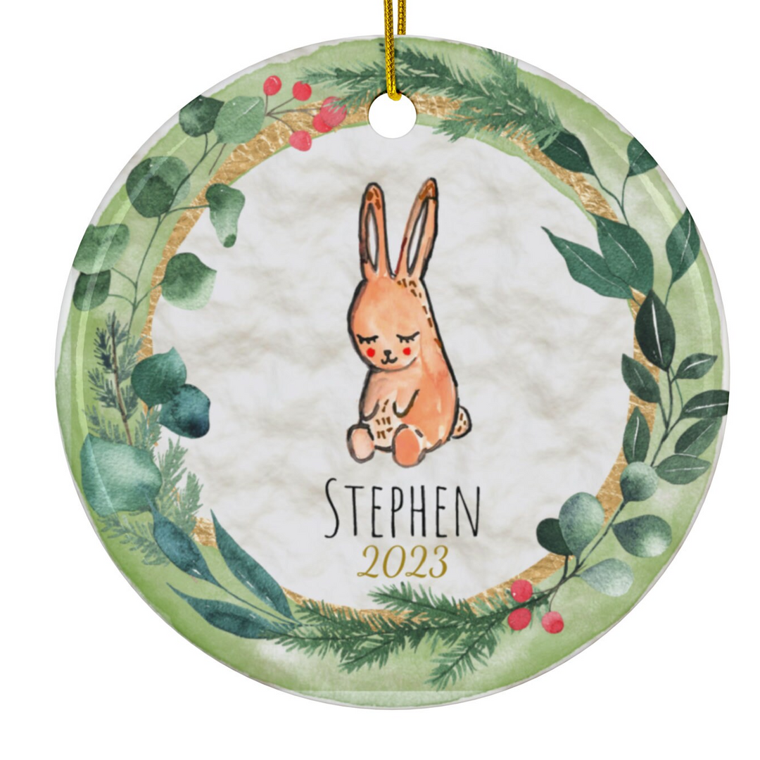 a round ornament with a picture of a rabbit on it