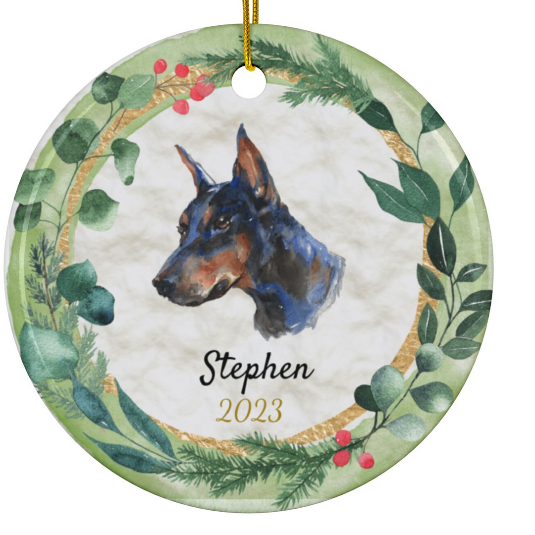 a ceramic ornament with a dog's head in a wreath