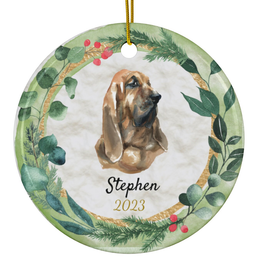 a christmas ornament with a dog's face in a wreath
