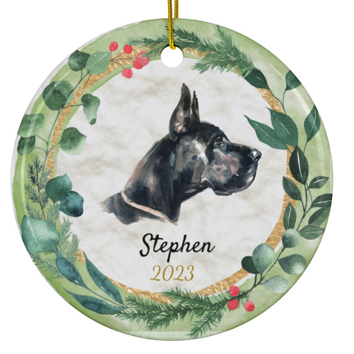 a ceramic ornament with a dog's head in a wreath