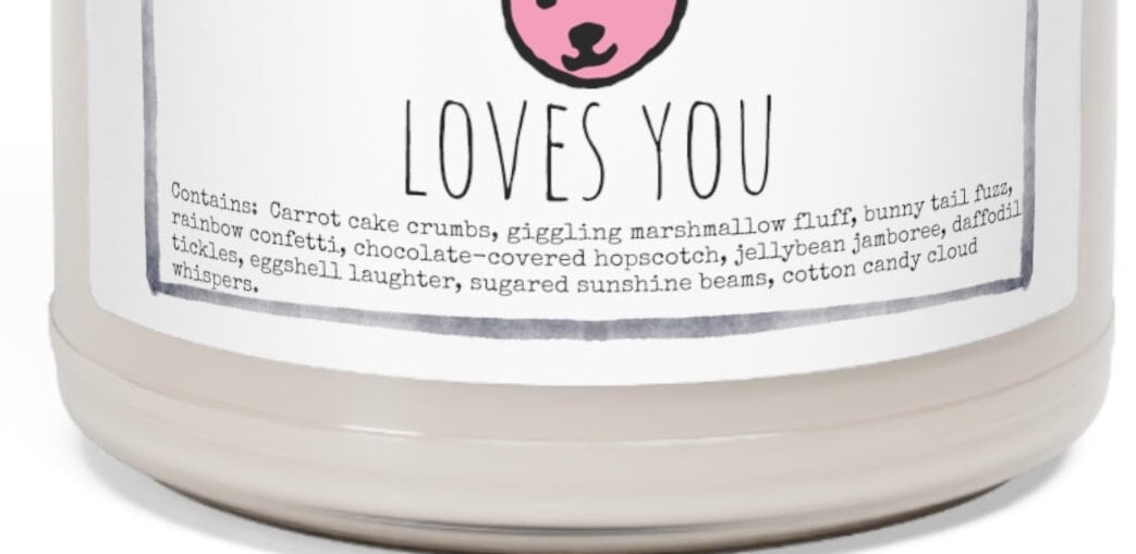 a jar of love&#39;s you candle on a white background